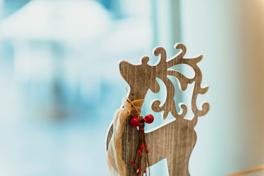 brown wooden carved reindeer decoration