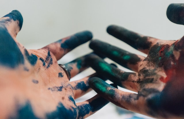 dirty hands in paint