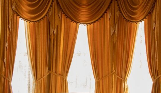 How to Hang Curtains With Rings and Hooks