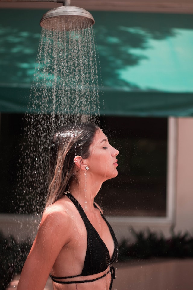 person standing under the shower