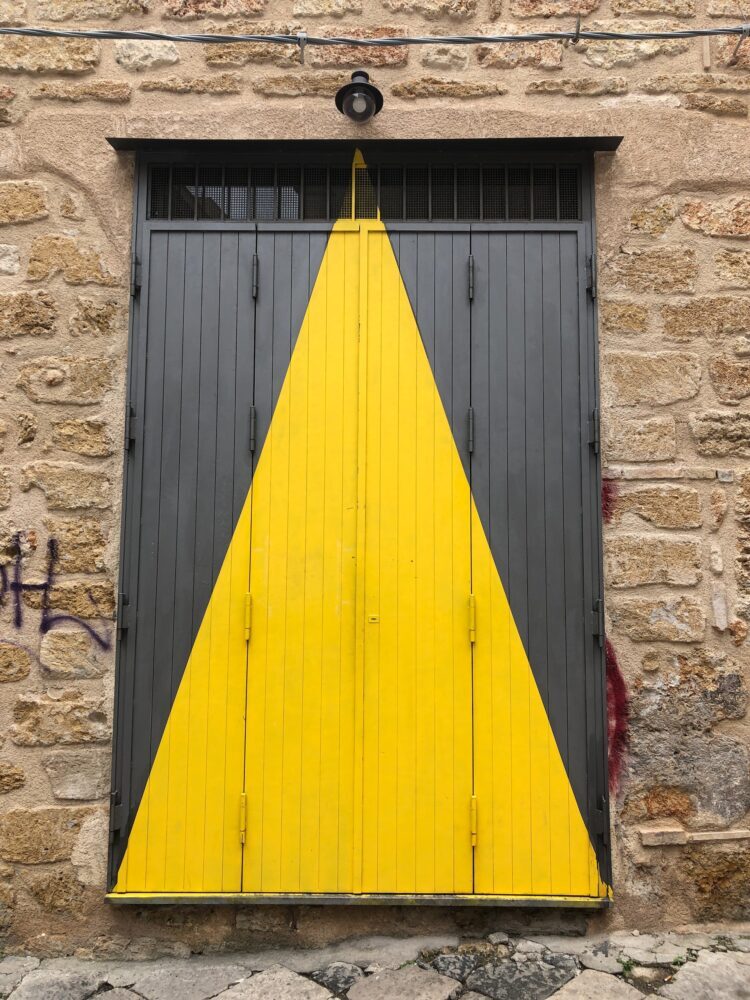 yellow and black painted door