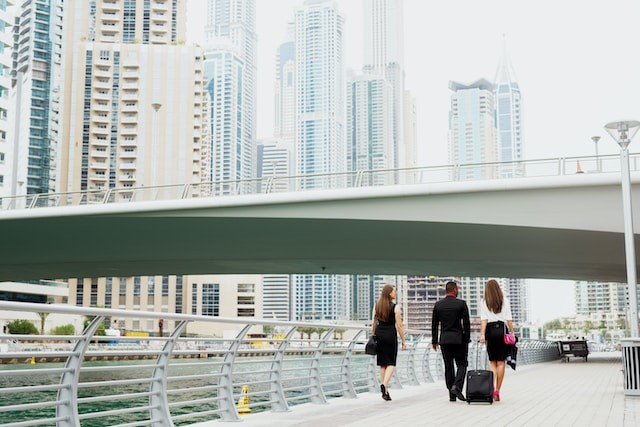 persons walking in dubai